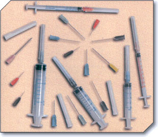 Disposable syringes and needles