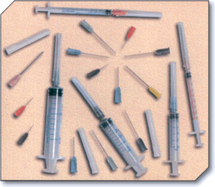 Disposable syringes and needles